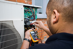 Servicing air conditioning unit
